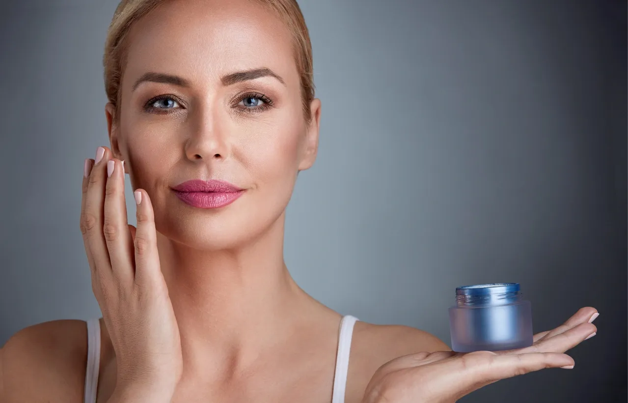 Skincare Routine FAQ Section Women holding skincare product